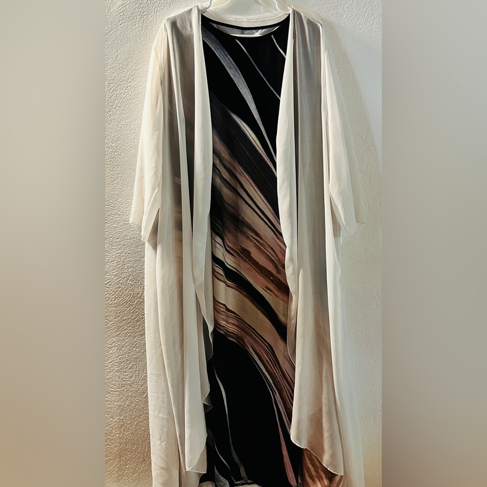 A two piece set, dress and light weight cover.